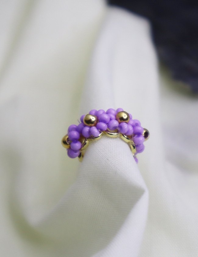 earcuff lila descuento lateral